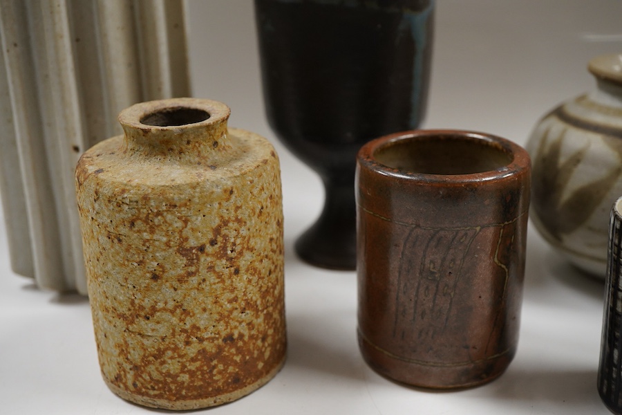 Assorted studio pottery comprising six vases and a goblet, largest 15cm high